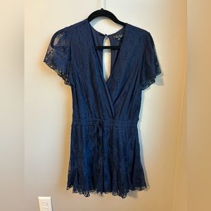 Francesca’s floral lace romper with cinched waist, size medium